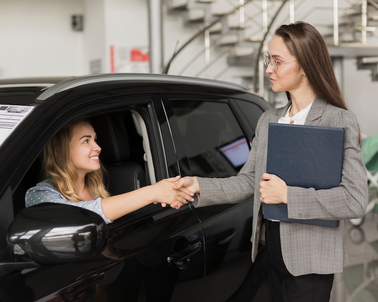 Enterprise Car Rental location at Calgary Airport with variety of rental cars in lot