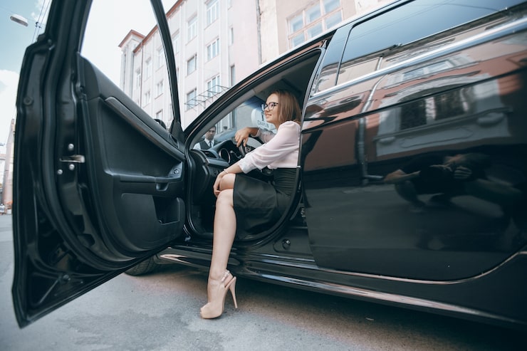 Luxury limo parked outside a modern building in Toronto, showcasing comfort and style.
